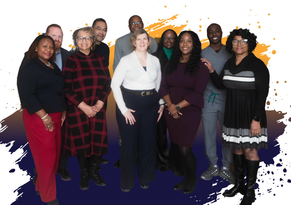 Diverse group of employees smiling together at the Georgia Department of Behavioral Health and Developmental Disabilities.